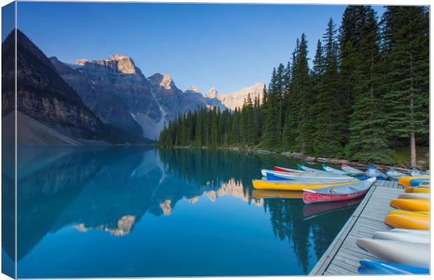 Canoes at Moraine Lake Canvas Print by Arterra 