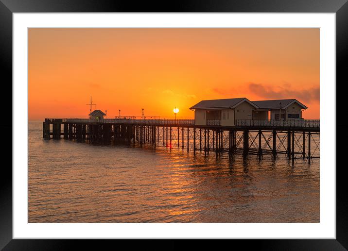 Rising sun on Penarth Pier Framed Mounted Print by Dean Merry