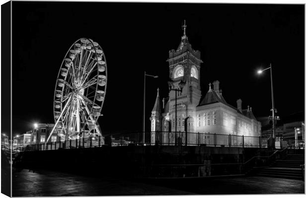 Looking up at the Pierhead building and Wheel  Canvas Print by Dean Merry