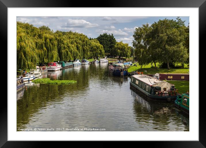 Boats line the river side of the River Great Ouse Framed Mounted Print by Jason Wells