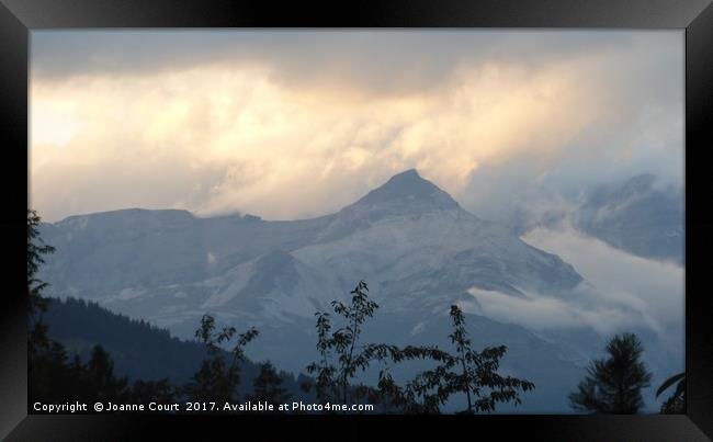 Swiss Alps in the early evening. Framed Print by Joanne Court
