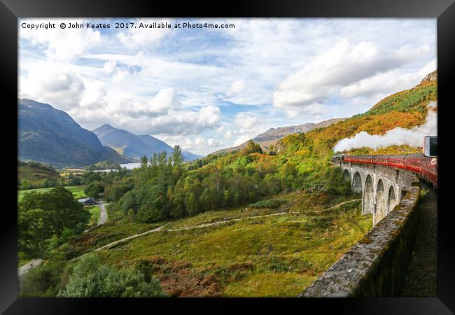 A steam engine going over the Glenfinnan Viaduct  Framed Print by John Keates