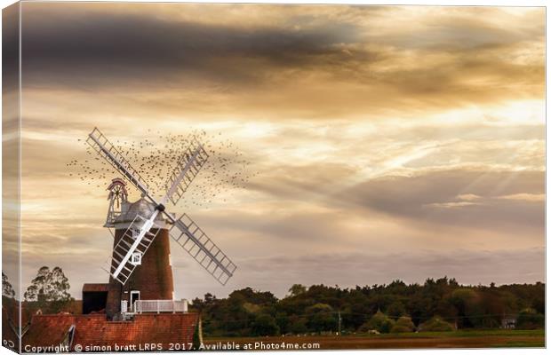 Cley windmill Norfolkwith flock of birds at sunse Canvas Print by Simon Bratt LRPS