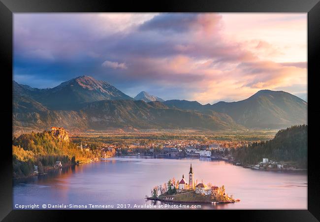 Lake Bled and its island at sunrise Framed Print by Daniela Simona Temneanu