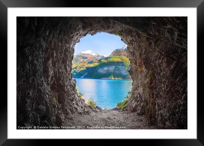 Mountain cave with a colorful view Framed Mounted Print by Daniela Simona Temneanu