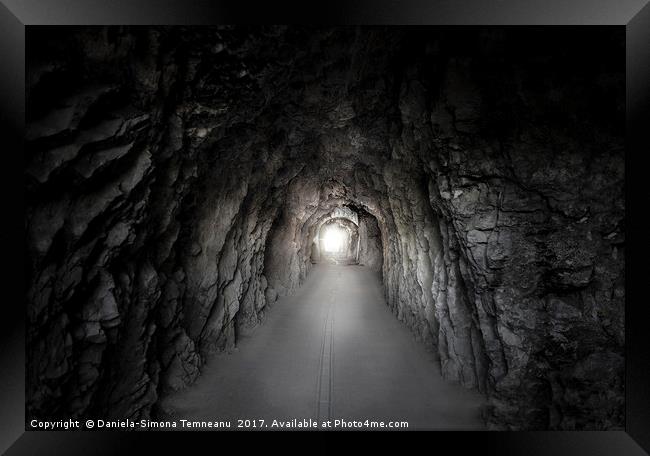 Stone tunnel under a mountain Framed Print by Daniela Simona Temneanu