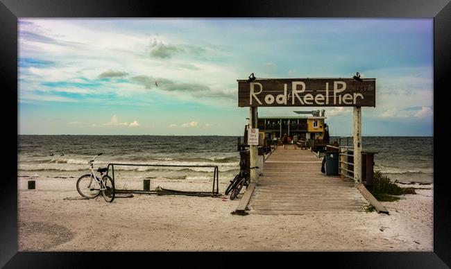 Rod & Reel Pier and a Bike Framed Print by Neal P