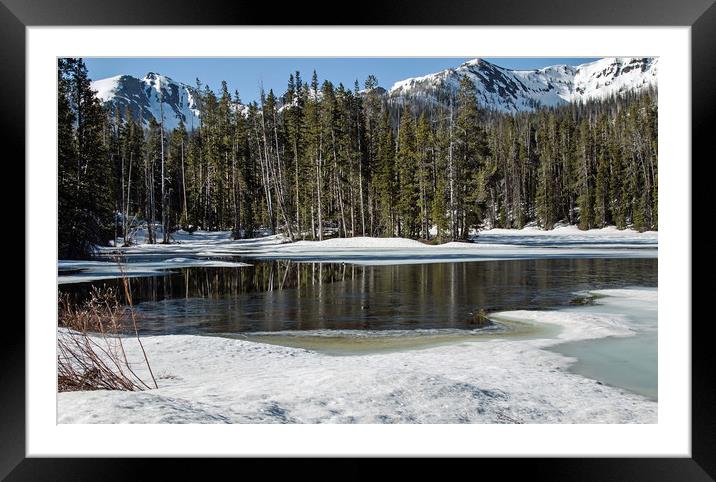 Frozen River High in Rockies Framed Mounted Print by Janet Mann