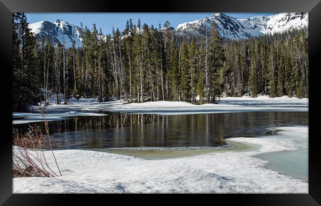 Frozen River High in Rockies Framed Print by Janet Mann