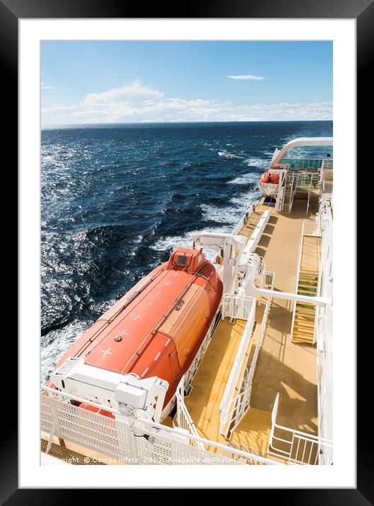 lifeboat on a cruise ship on the sea Framed Mounted Print by Chris Willemsen