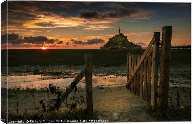 Through the gate at Mont St Michel, France. Canvas Print by Richard Morgan