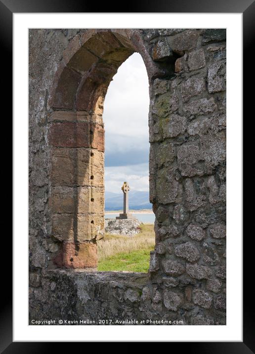 Celtic cross and remains of St Dynwen's church, Ll Framed Mounted Print by Kevin Hellon