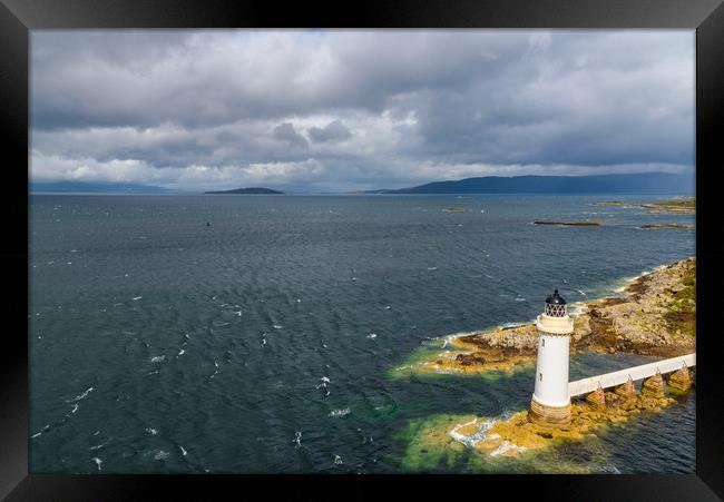 Scottish highlands lighthouse Framed Print by Marco Bicci