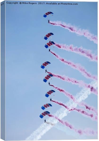 RAF parachute team in free fall.  Canvas Print by Mike Rogers