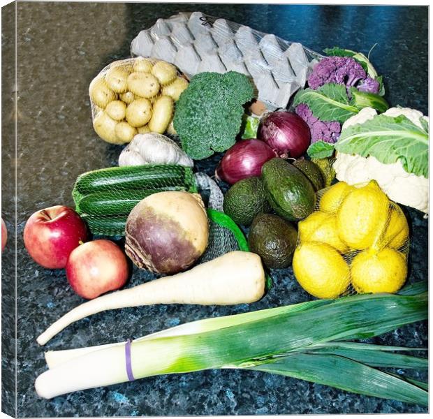 A display of mixed fresh vegitables. Canvas Print by Geoff Childs