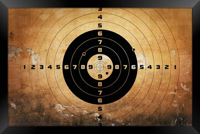 target with bullet holes Framed Print by Guido Parmiggiani