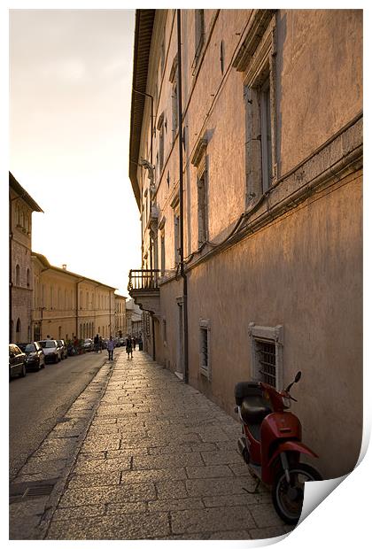 Moped in street at sundown in Assisi, Italy Print by Ian Middleton