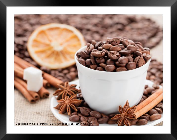 Grains coffee in cup. Cinnamon and anise on a dish Framed Mounted Print by Sergii Petruk