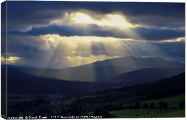 Pitlochry- Light beams on the hills Canvas Print by Derek Daniel