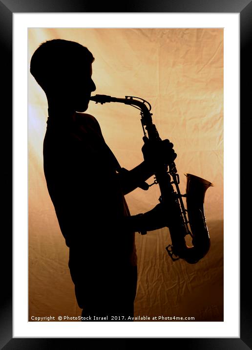 Saxophone player Framed Mounted Print by PhotoStock Israel