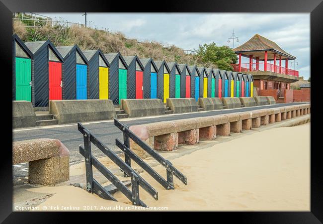 Beach Huts along Lowestoft Beach Framed Print by Nick Jenkins