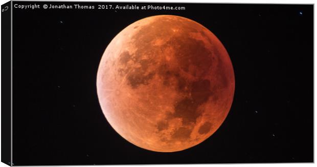 Supermoon Lunar Eclipse Canvas Print by Jonathan Thomas