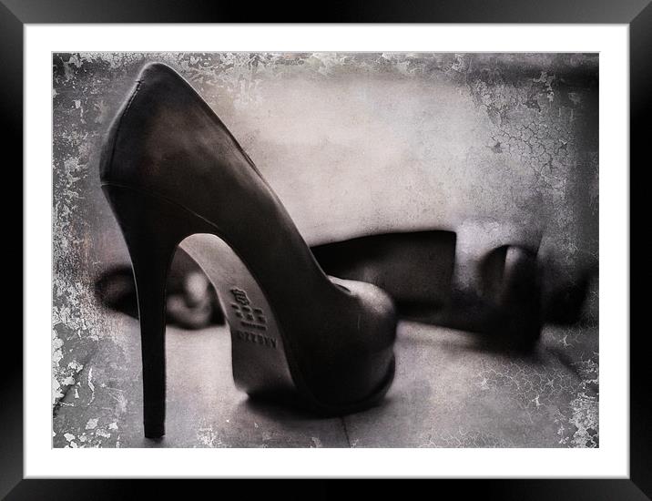 Dirty high heel shoes Framed Mounted Print by K. Appleseed.