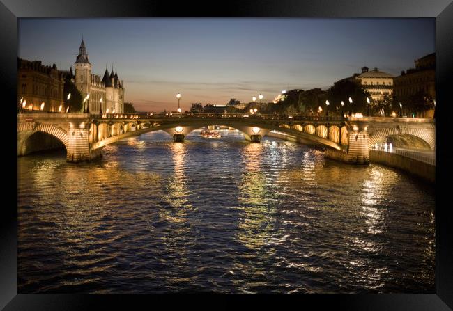 La Conciergerie and Seine River at Dusk Framed Print by Luc Novovitch