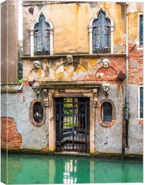 Back street canal in venice Canvas Print by Paul Nicholas