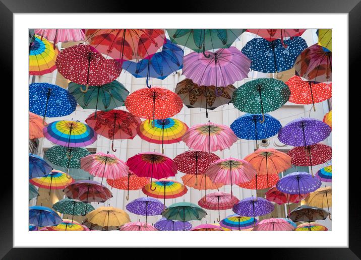 Umbrella Skies Framed Mounted Print by benny hawes