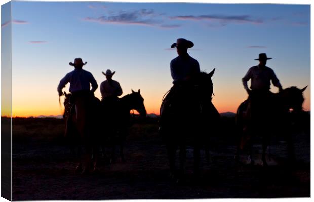 Cowboys at sunrise Canvas Print by Luc Novovitch