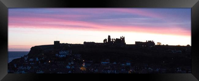 Sunrise behind Whitby famous for Dracula Stories Framed Print by Janet Mann