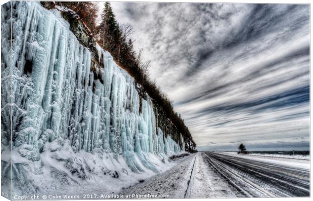 Frozen road in Gaspesie Quebec Canvas Print by Colin Woods
