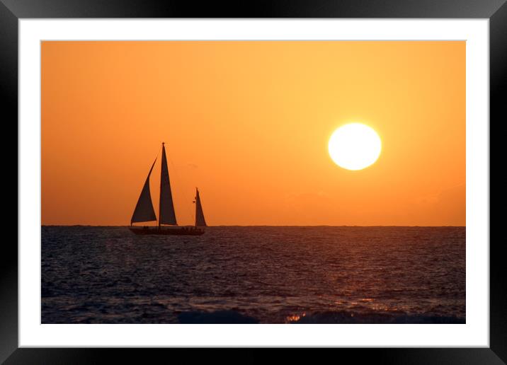 Yacht in La Bocayna Sunset Framed Mounted Print by Kevin McNeil