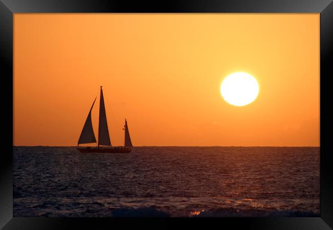Yacht in La Bocayna Sunset Framed Print by Kevin McNeil