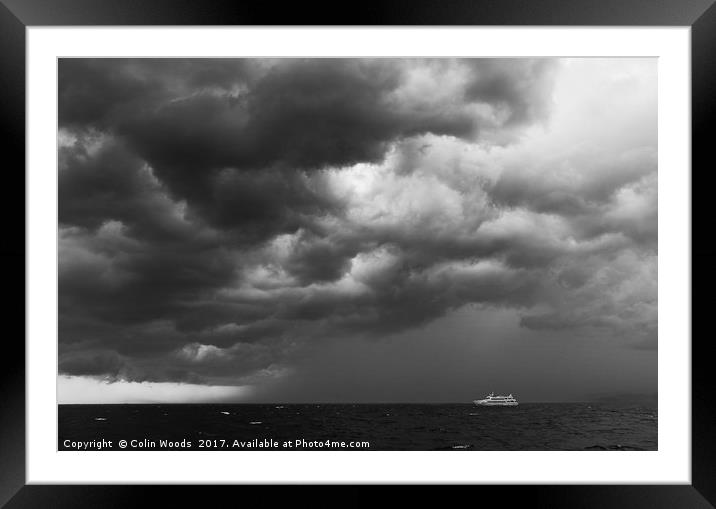 Boat and Approaching Storm Framed Mounted Print by Colin Woods