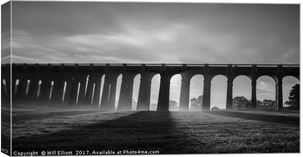 Balcombe Viaduct in the Misty Moonlight Canvas Print by Will Elliott