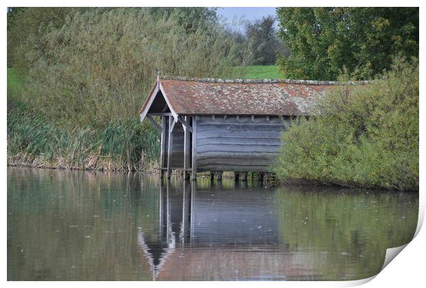 Tranquil Boathouse Print by Simon Hackett