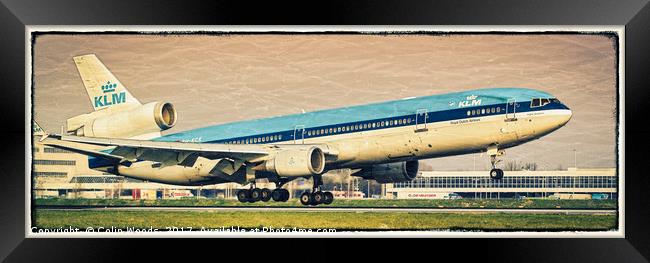 A KLM McDonnell Douglas MD-11 landing at Schiphol  Framed Print by Colin Woods