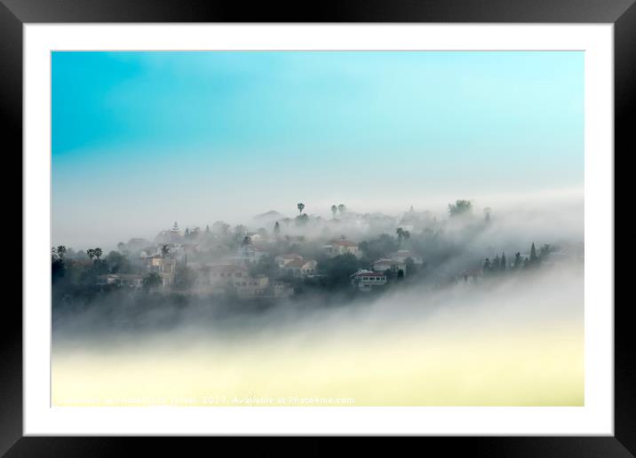mountainous rural village in mist Framed Mounted Print by PhotoStock Israel