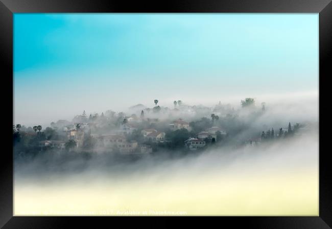 mountainous rural village in mist Framed Print by PhotoStock Israel