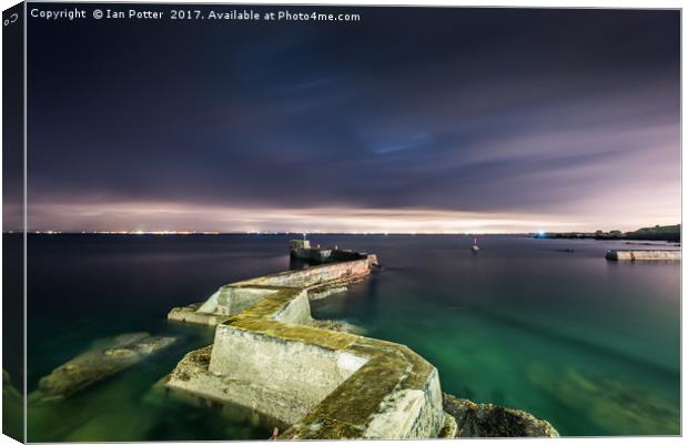 St Monans harbour and walkway Canvas Print by Ian Potter