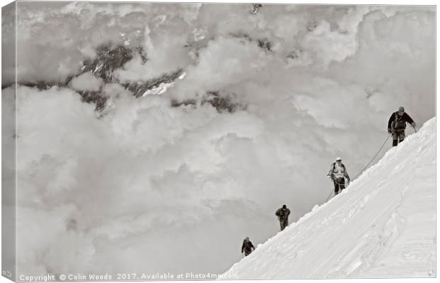 Climbers high in the Swiss Alps, on the traverse o Canvas Print by Colin Woods