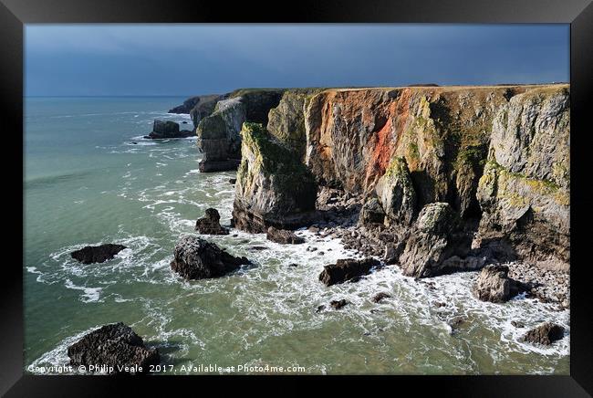 Stack Rocks Pembrokeshire as a storm approaches. Framed Print by Philip Veale