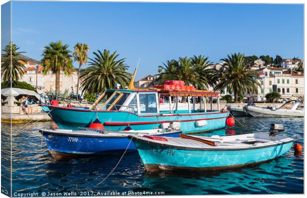 Colourful boats in Hvar Town Canvas Print by Jason Wells