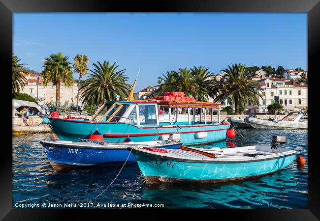 Colourful boats in Hvar Town Framed Print by Jason Wells