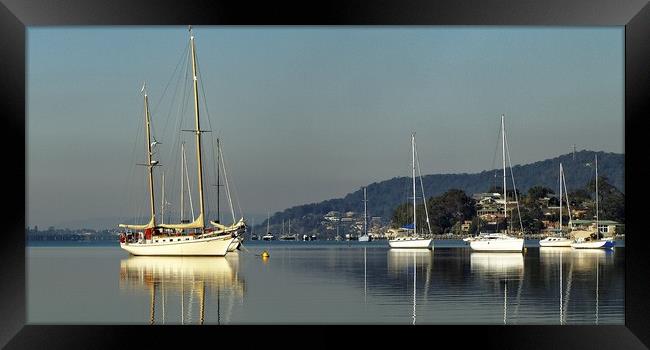 Herreshoff ketch and Yacht Reflections.  Framed Print by Geoff Childs