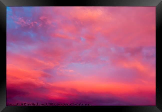 red cloudscape at sunset. Framed Print by PhotoStock Israel