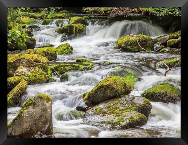 Rushing Water Framed Print by David Belcher