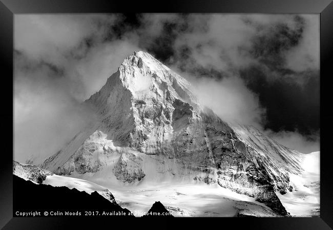 The mighty Dent Blanche in the Valais area of the  Framed Print by Colin Woods